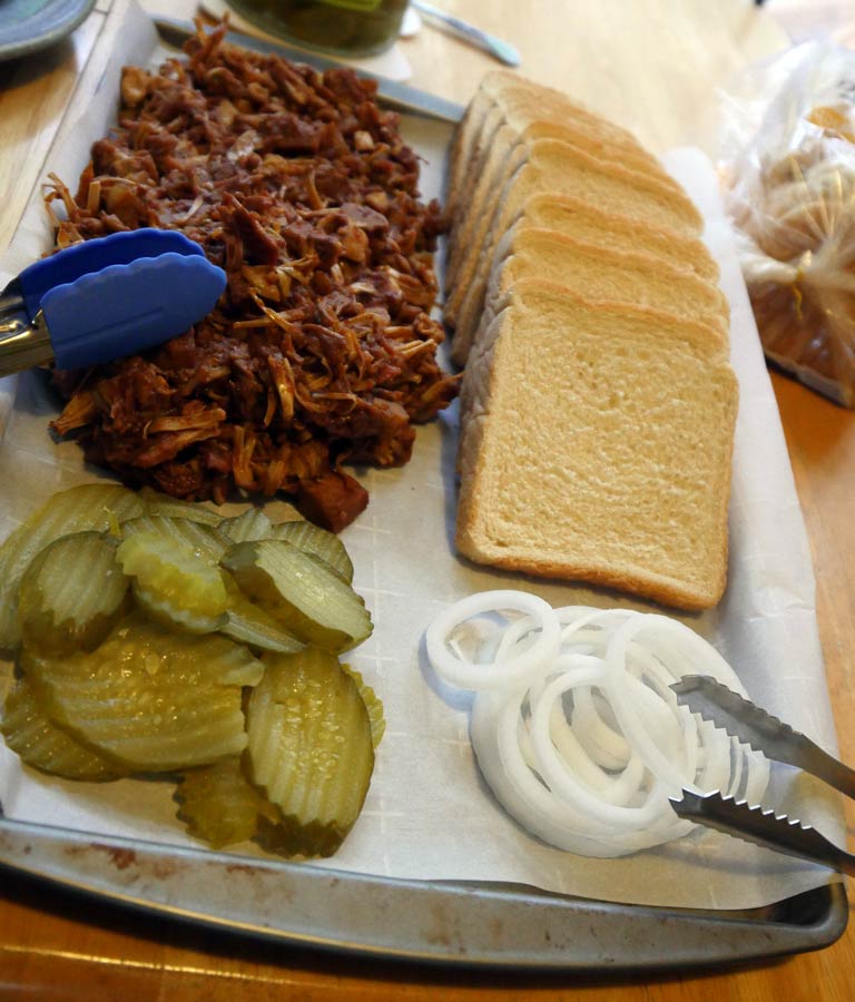 vegan pulled pork sandwiches with pickles and onions