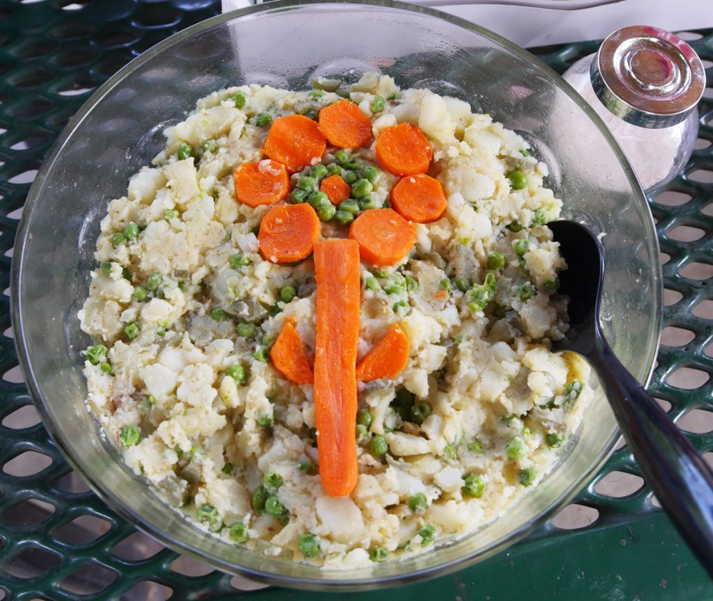 vegan salad olivieh with carrot flower design