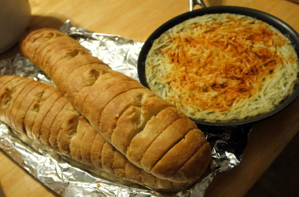 vegan artichoke and white bean spread with baguettes