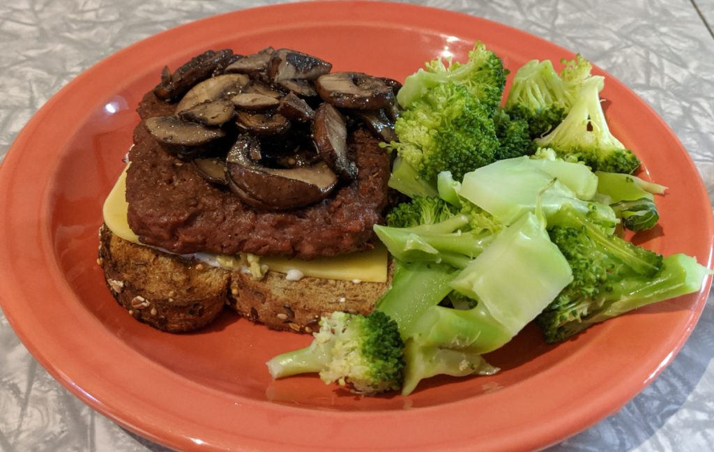 Beyond Burger ground burger on toast with mushrooms and side of broccoli
