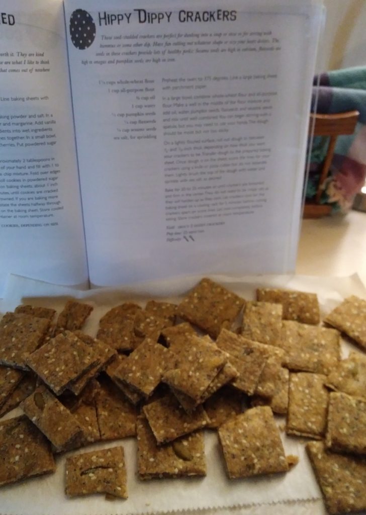 seedy crackers in front of cracker recipe