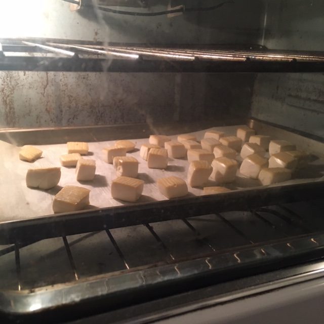 tofu baking in an oven