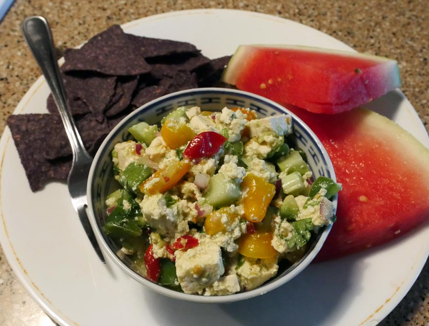 vegan ceviche with watermelon and blue tortilla chips