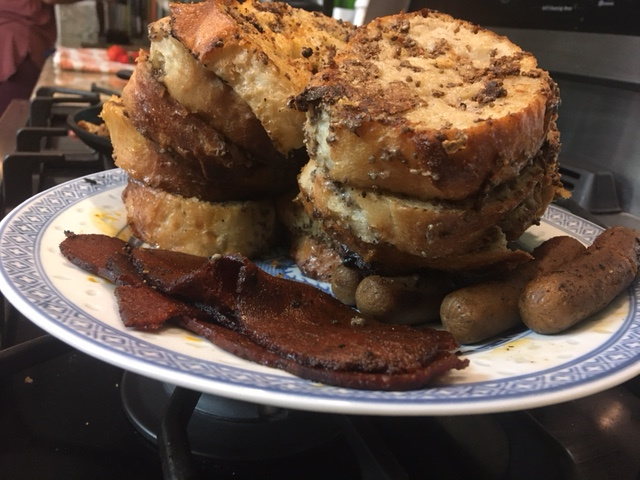 stack of vegan French toast, sausage, and bacon