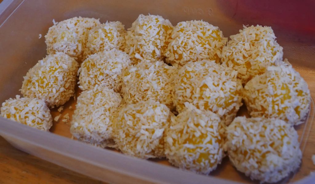 mango mochi with coconut shreds