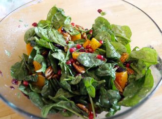 buttenut squash, spinach, pecan, pomegranate seed salad