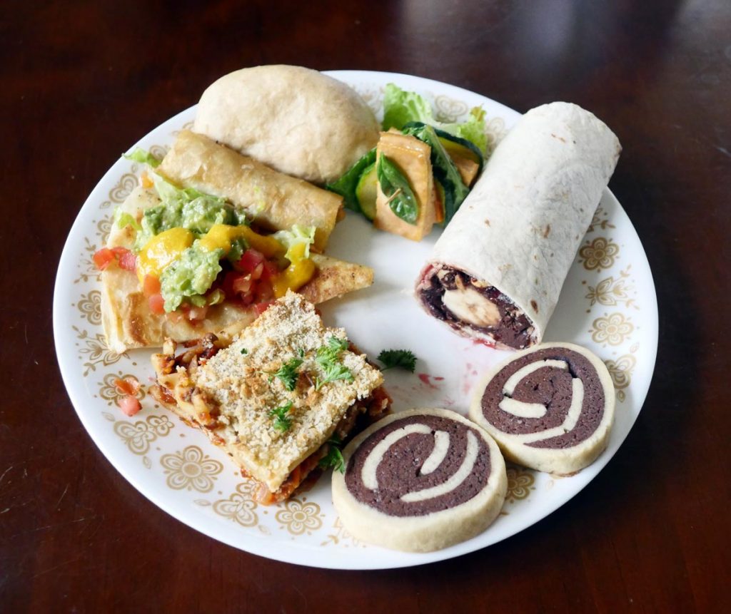 plate of vegan stacks, wraps, and rolls