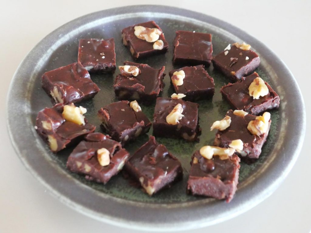 vegan fudge with walnuts on a plate
